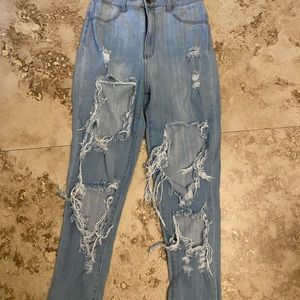 Aphrodite brand super distressed light wash jeans